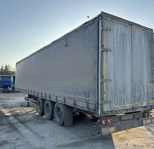 Полуприцеп тентованный Kogel Cargo-MAXX SN24, 2011