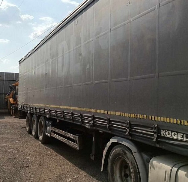 Полуприцеп тентованный Kogel Cargo-MAXX SN24, 2012